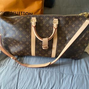 Louis Vuitton Keepall 55. New, never used, with duster.